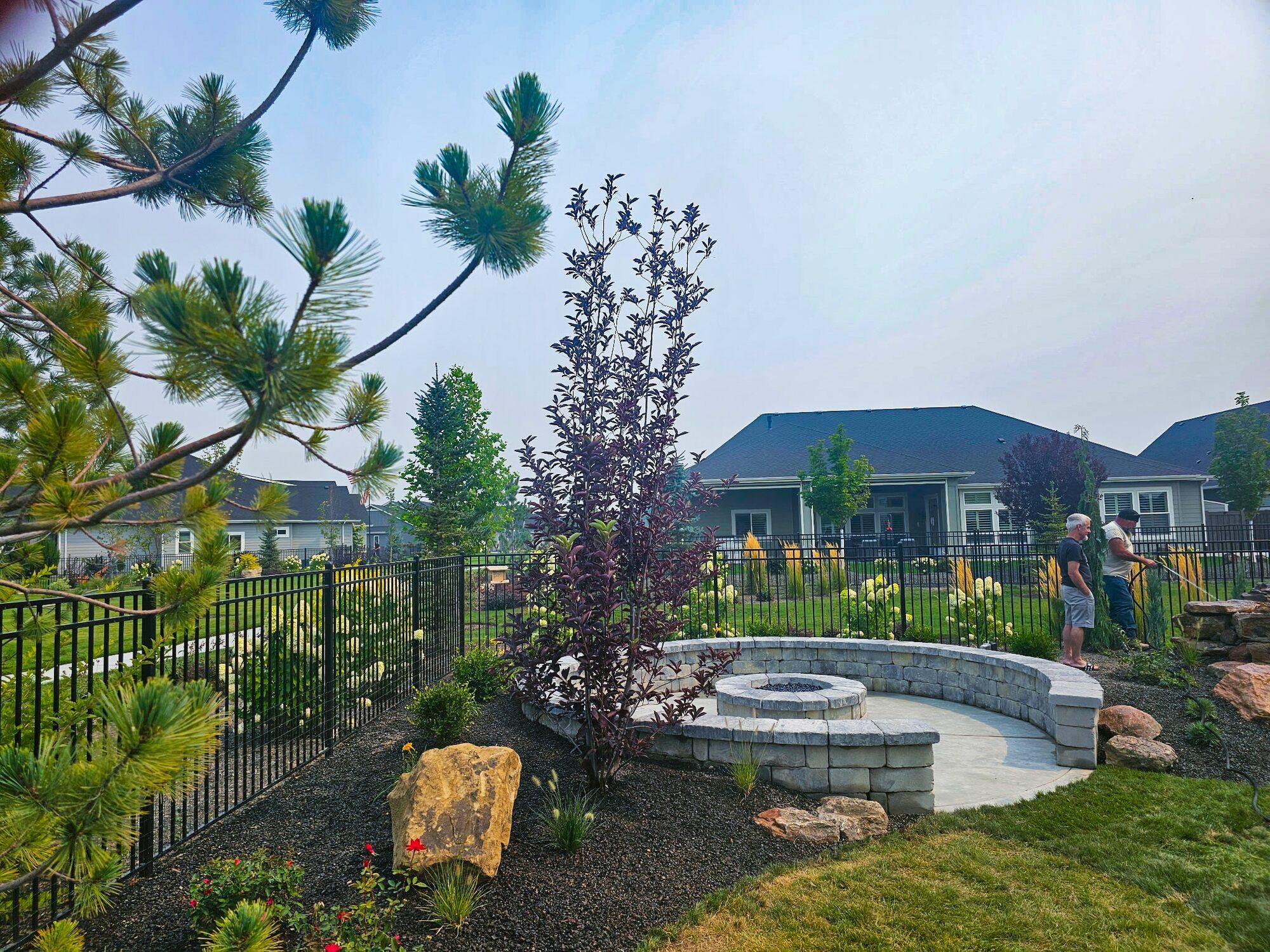Backyard fire pit after a makeover